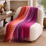 Manta Orbit en lana 100 % hecha a mano con patrón rítmico y colorido