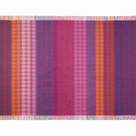 Manta decorativa Orbit con franjas verticales y tonos vibrantes